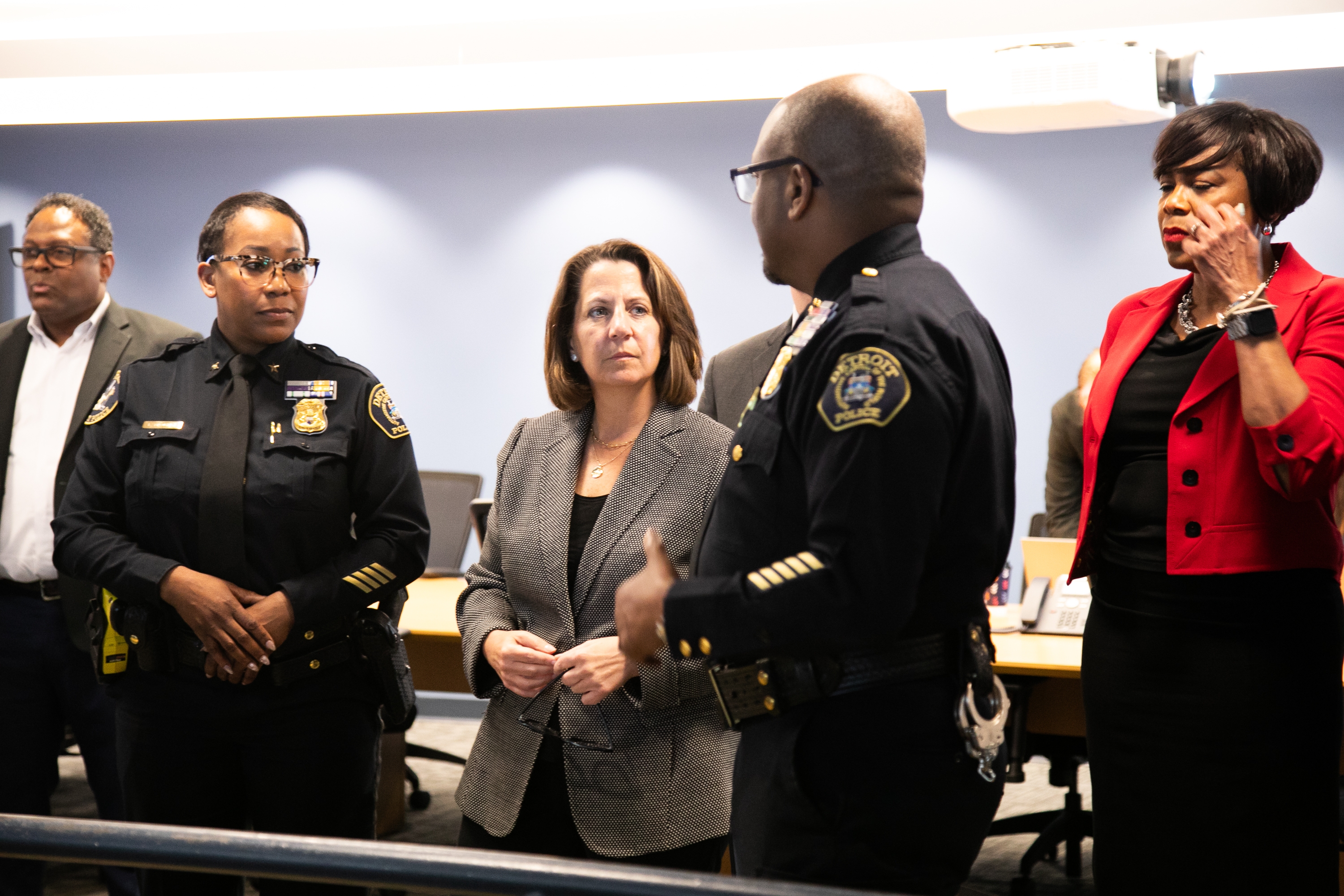 Deputy AG Monaco listening to Detroit Police Chief James White at the Detroit Police Department’s Real-Time Crime Center.