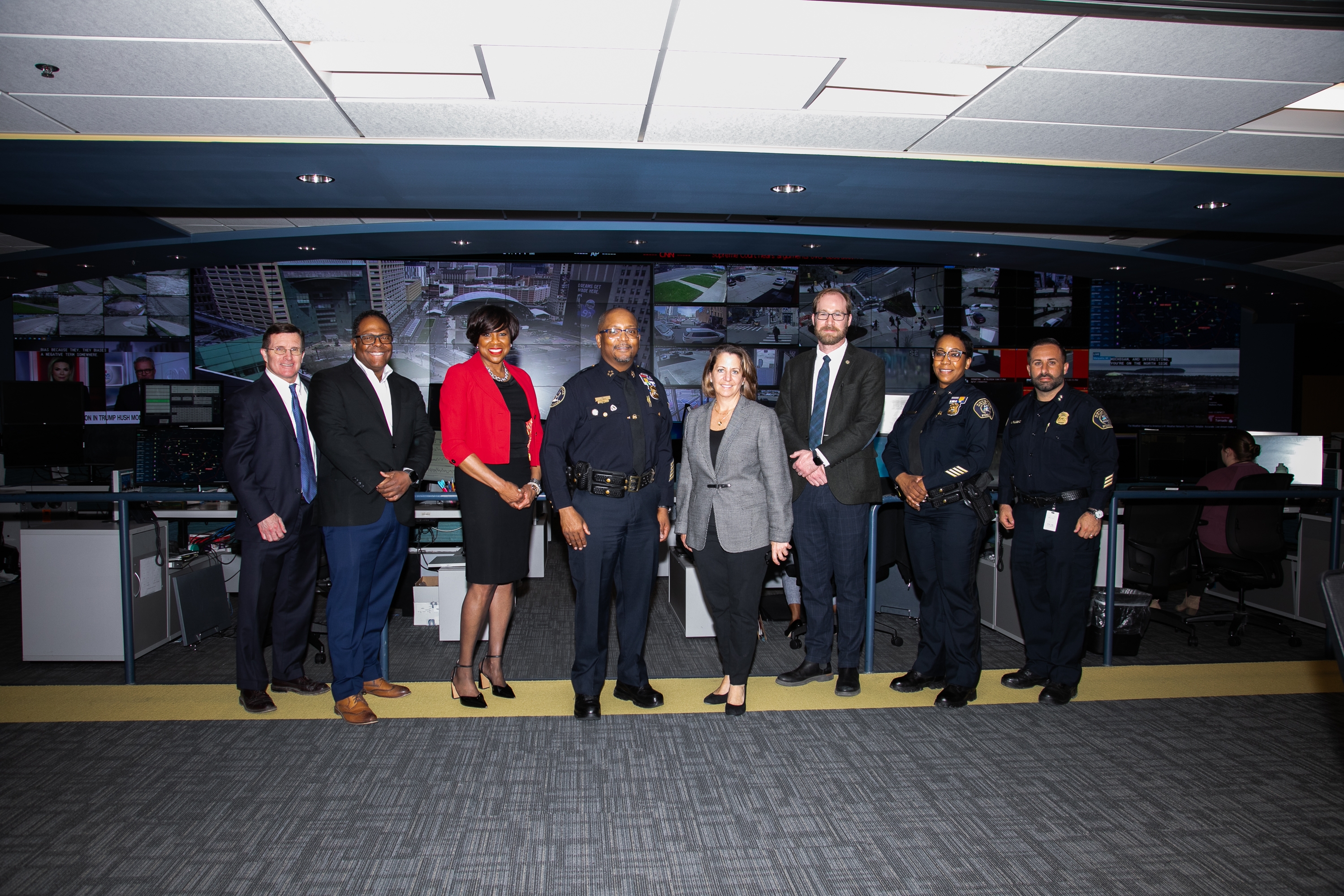Deputy AG Monaco with U.S. Attorney Ison, Detroit Police Chief James White, and other city and law enforcement officials at the Detroit Police Department's Real-Time Crime Center.