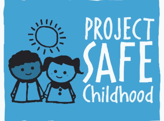 Project Safe Childhood text and logo with illustration of sun and two children