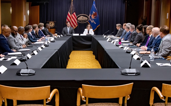 Deputy Attorney General Lisa O. Monaco (center right) leads with opening remarks at a roundtable meeting of senior Justice Department officials in the Department of Justice in Washington, D.C.