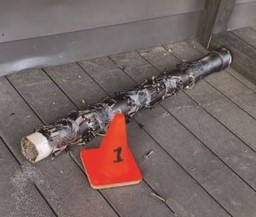Bomb next to orange cone